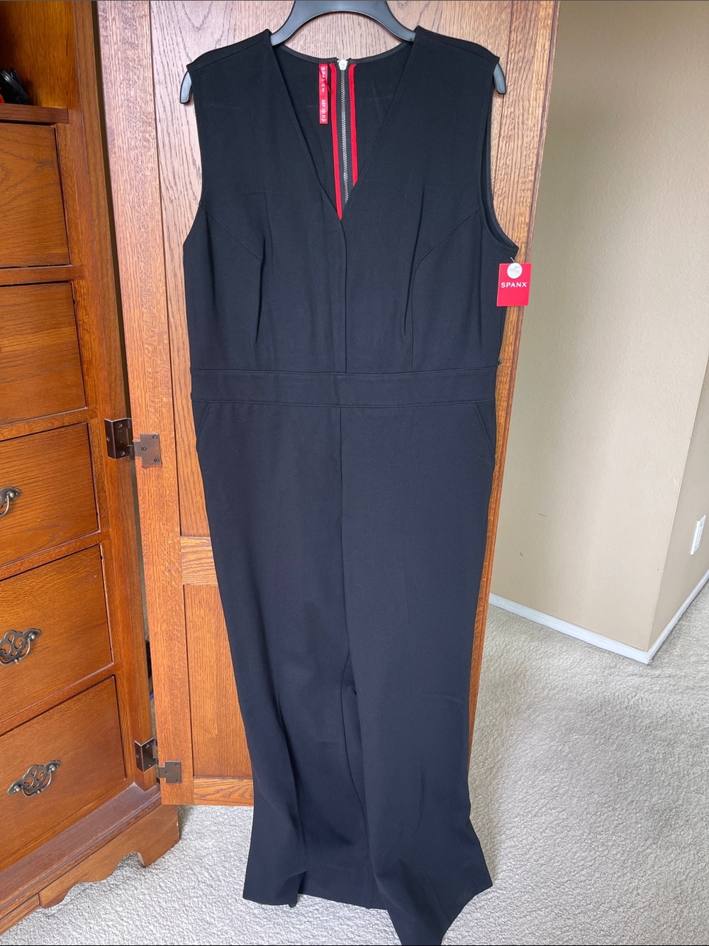 SPANX Black Sleeveless Jumpsuit with Red Zip Trim